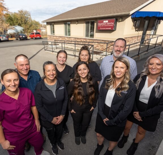 Frandsen Dental of Grantsville team members standing outside of dental office