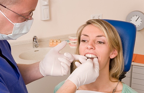 Patient in Grantsville talking to dentist about Invisalign